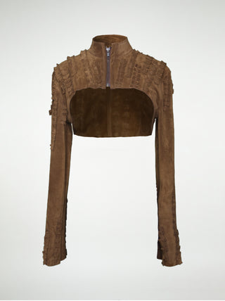 A front view of brown suede over-bust shrug jacket with long sleeves and strips of pleated leather stitched onto the shoulders and sleeves.