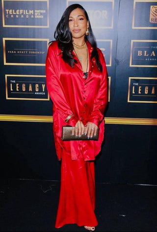 Melanie Fiona wearing a custom pant and shirt.
