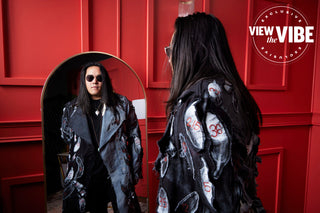 Aysanabee wearing the X Travis Shilling X Aysanabee X Call and response Juno's collab jacket