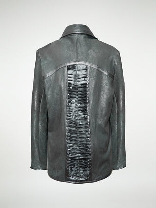The back view of a black leather men's jacket with a panel of pleated cowhide on the front and back.