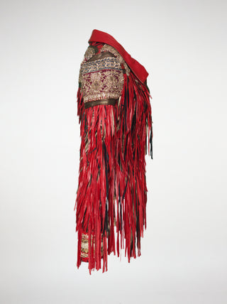 Side view of red and bronze fringed jacket on a white background