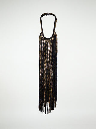 A gold fringed leather neckpiece with a metal snap closure.