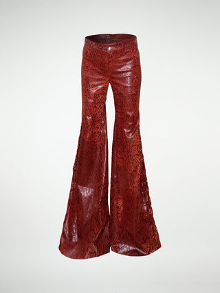 Front view of wide leg leather trousers with woven leather panels and stud embellishments.