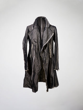 A black cotton and metal blend frock coat, featuring a two-way metal zipper and raw seam finishes.