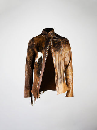 A brown leather jacket with panels of hair-on cowhide, hand-cut fringes, and metal stud embellishments.