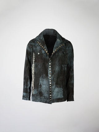 A distressed blue linen jacket with raw edge seam finishes and metal stud embellishments.