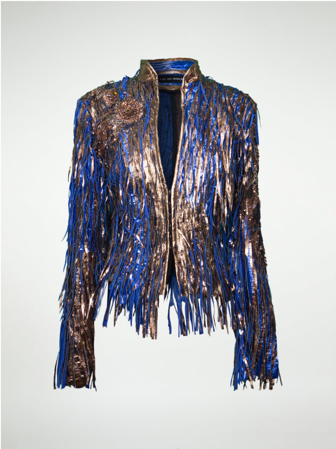 Metallic fringe jacket with blue and bronze colors on a white background