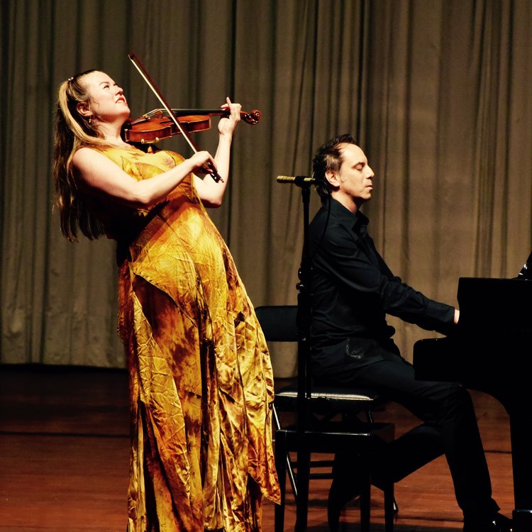 Laura St John wearing a call and response gown