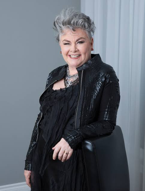 Mary Walsh wearing a call and response jacket and top