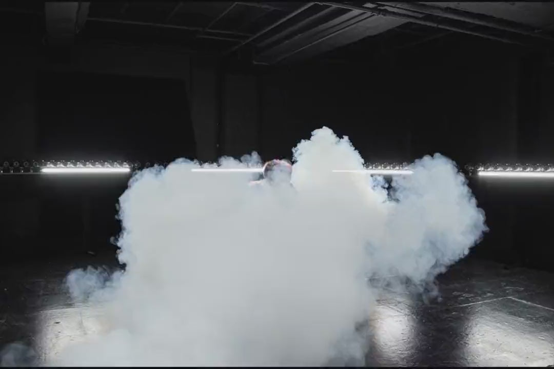 Callen Schaub jumping during a 360 slow motion shot. As he jumps, the call and response collab jacket is visible.