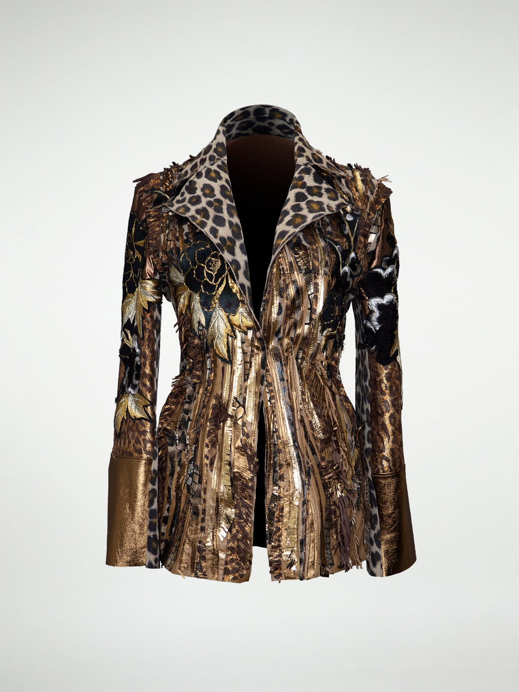 A gold and leopard print leather jacket with fringes and sequins on a leather base.