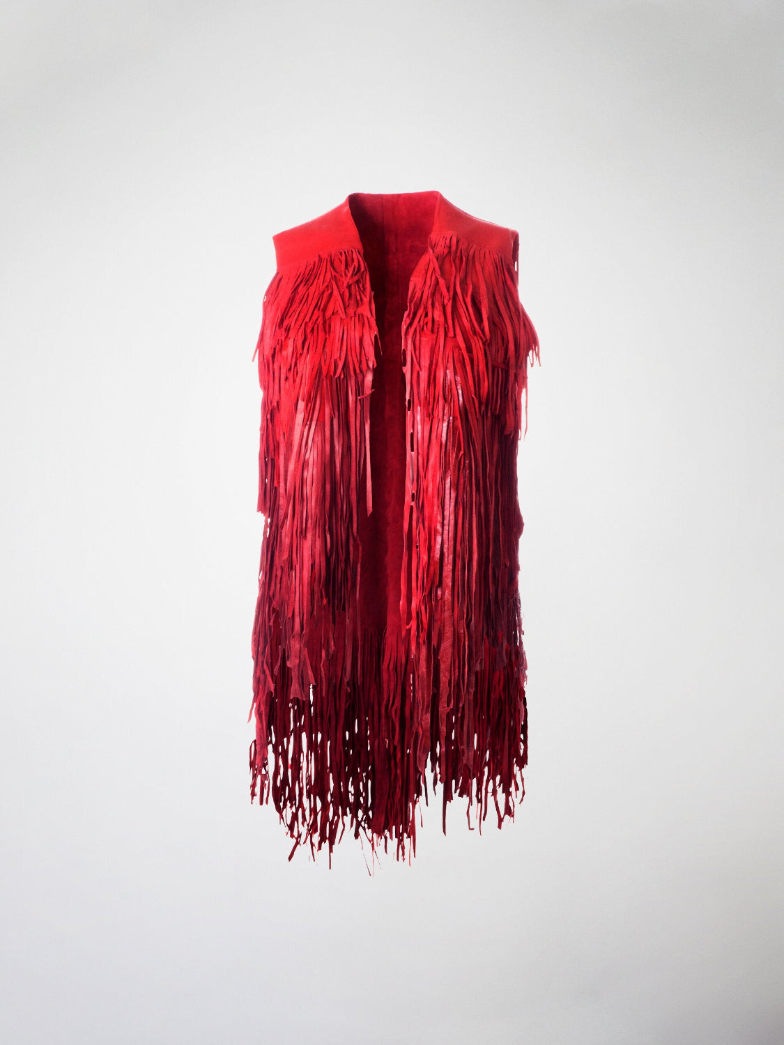 Red heavily fringed leather vest.
